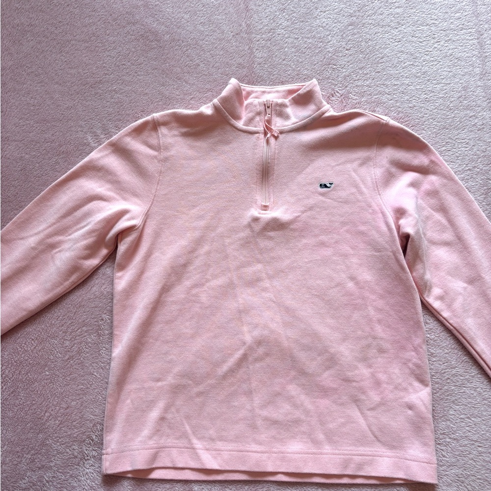 This is a vineyard vines light pink pullover in the size of medium,12-11 girls.